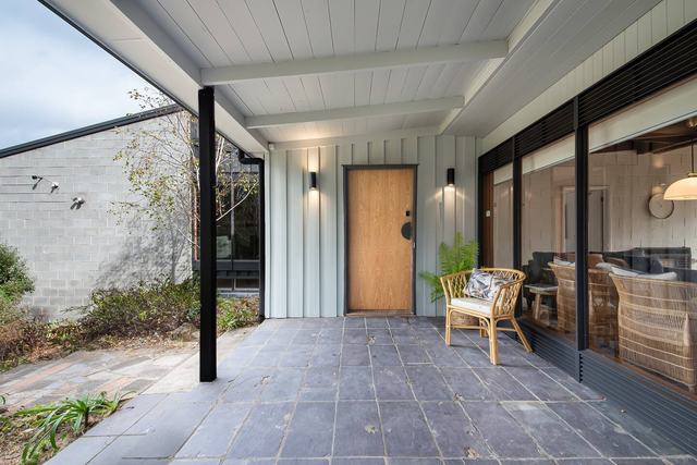 The front porch with the timber front door